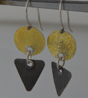 silver earrings with a lot of gold